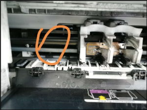 skidt inde i printeren